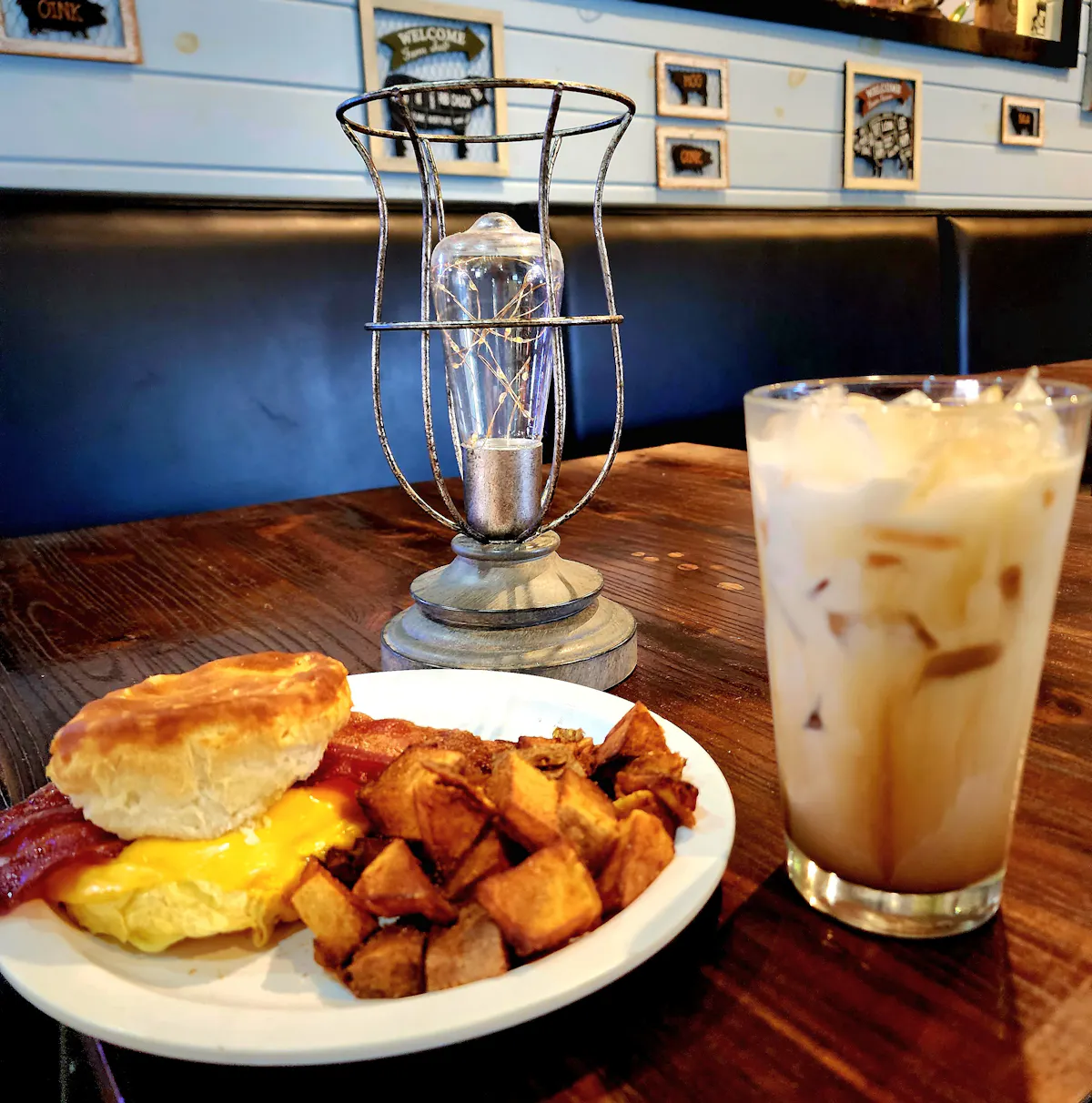 a plate of food and a cup of coffee on a table